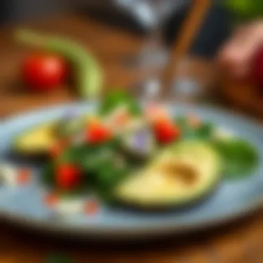 A beautifully plated dish featuring avocado and spinach, both high in vitamin E