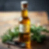 Natural rosemary oil bottle with fresh rosemary sprigs