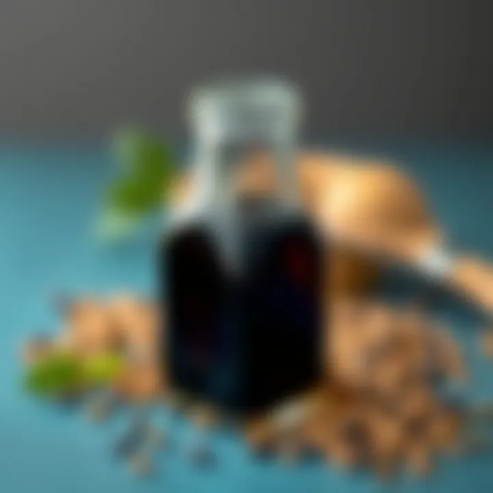 A close-up view of black seed oil in a glass bottle with seeds in the background