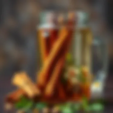 Close-up of cinnamon sticks and water with herbs in a jar