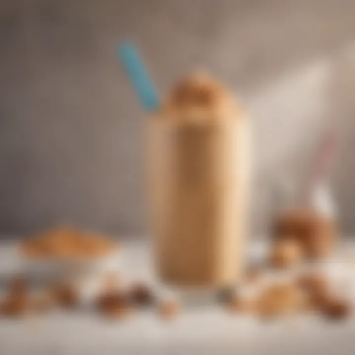 A close-up of a peanut butter smoothie topped with nuts