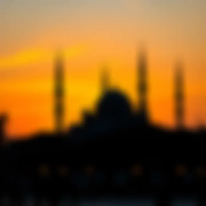 Mosque silhouette at sunset during iftar