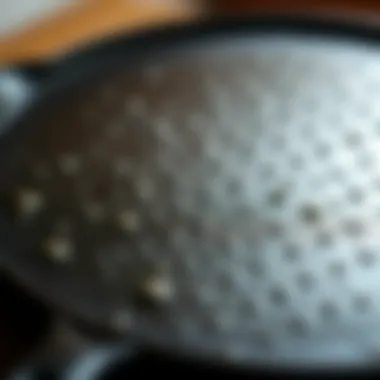 Craftsmanship in Cast Iron Close-up of the intricate details of a cast iron skillet's surface