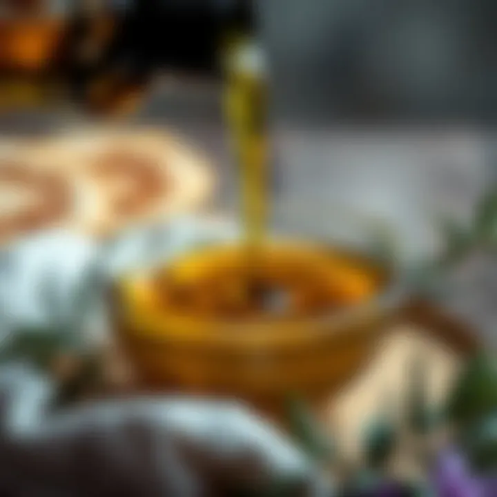 A close-up of olive oil being poured into a bowl