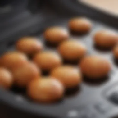 Detailed view of Philips Airfryer buttons highlighting their functions