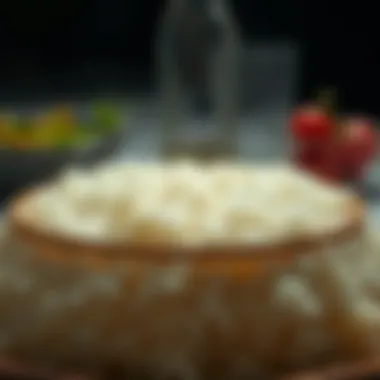 A close-up of perfectly cooked rice, fluffy and aromatic, served as a base for chicken