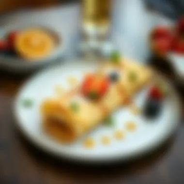 A beautifully plated crepe dish, garnished with fresh fruits and a drizzle of syrup.