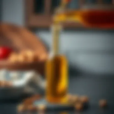 Sweet almond oil being poured into a bottle